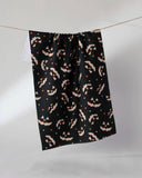 Haunted Grin Tea Towel